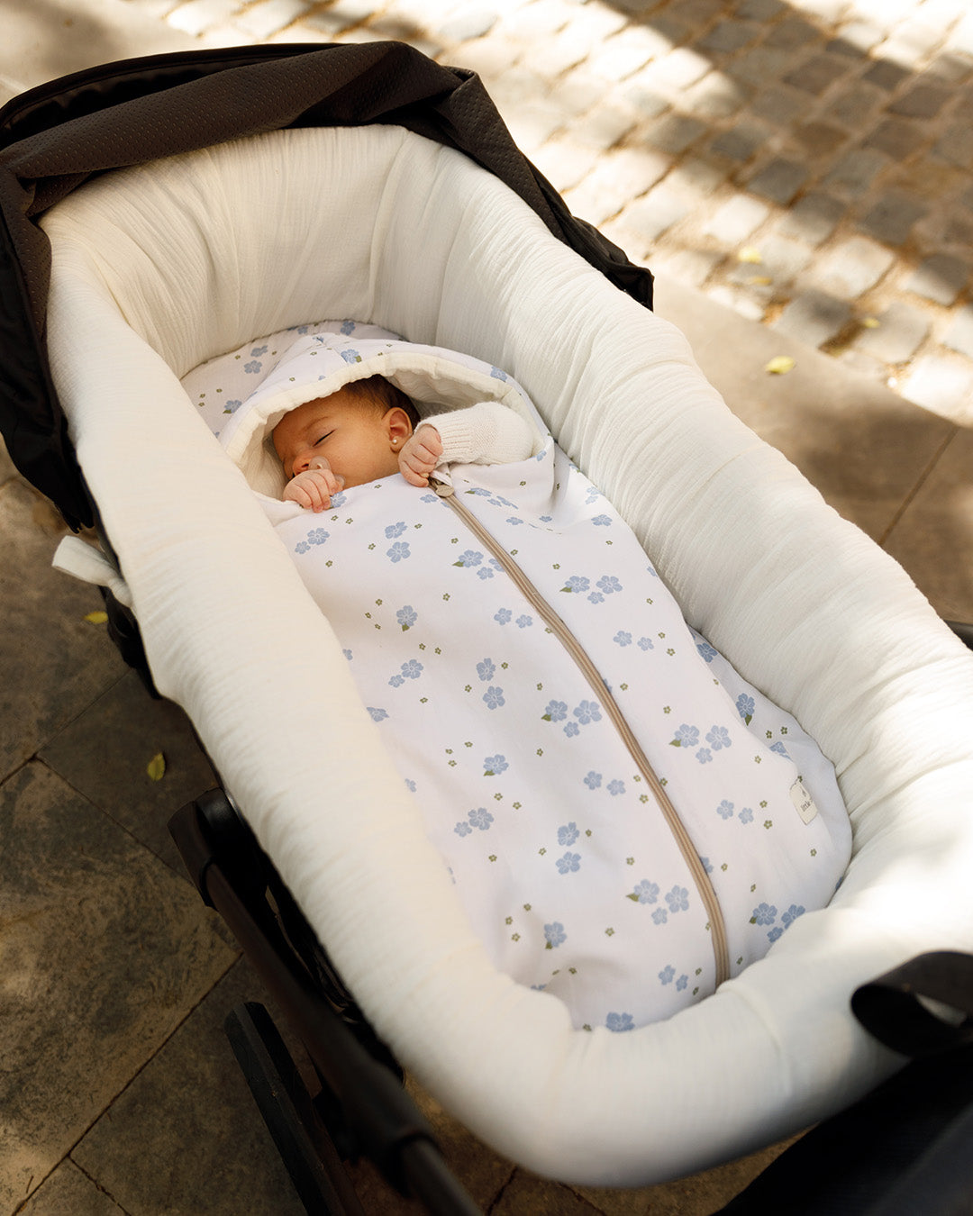 Mid-season footmuff Forget-Me-Not